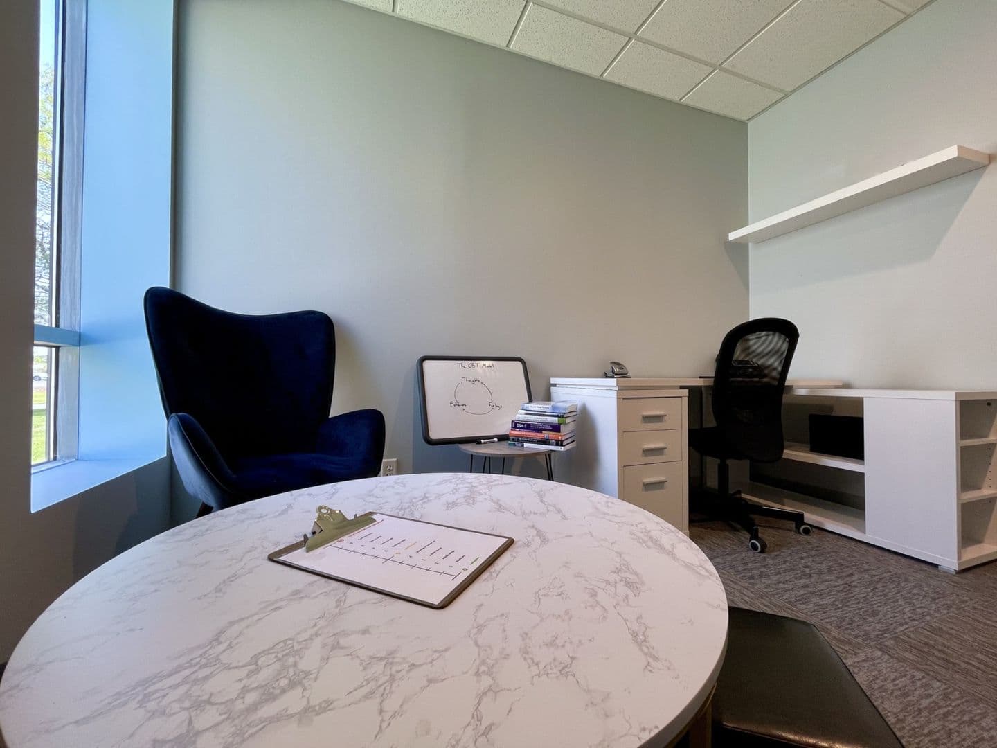 Room with desk and table
